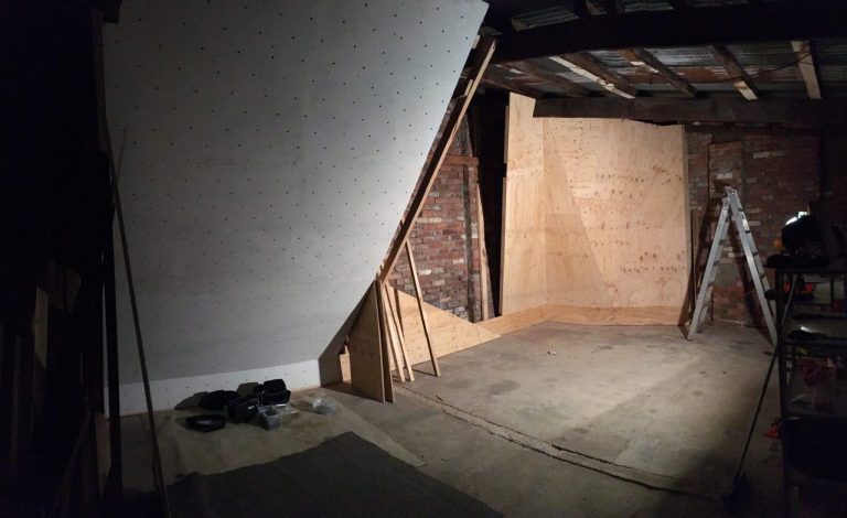 Home climbing wall in a converted room