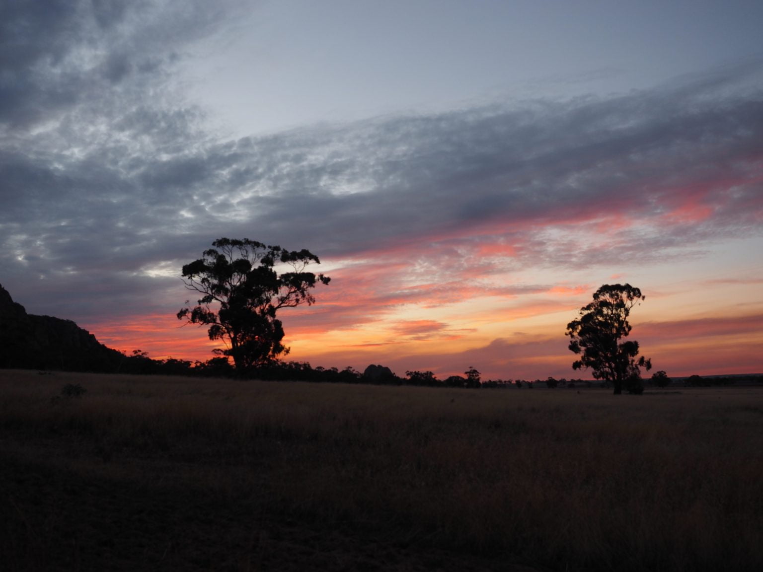 About Us 1 Sunset over the Australian bush