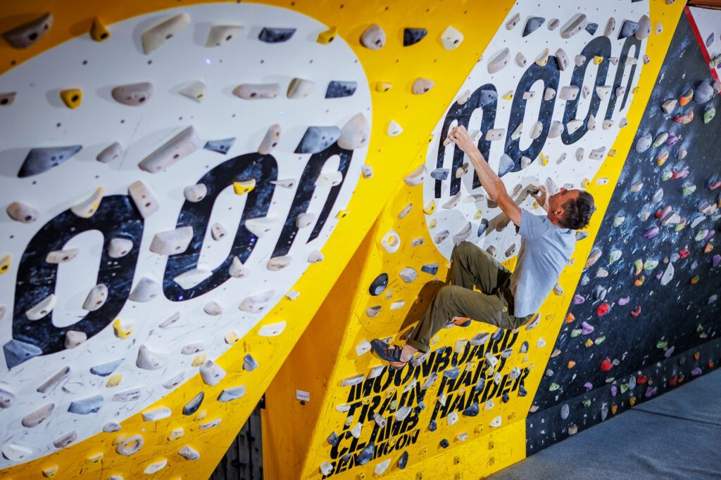 Climber on a MoonBoard